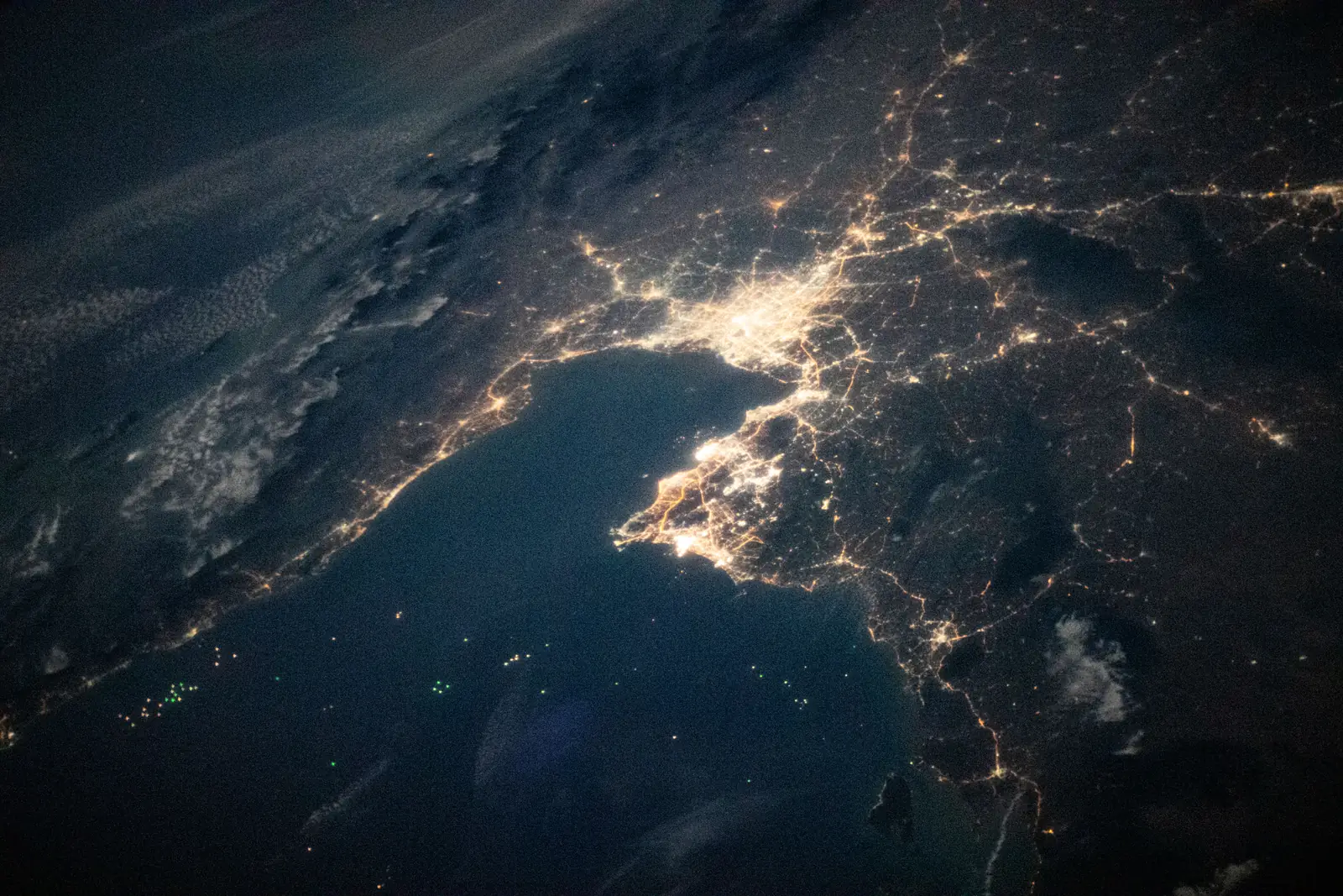 Bangkok and the Gulf of Thailand at night, seen from orbit